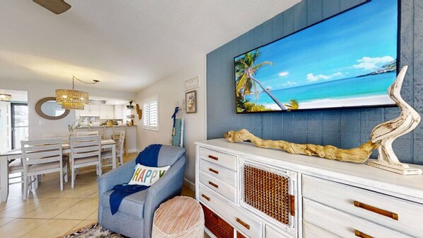 Living area with view of dining area and kitchen