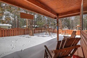 Relax out front on the covered porch chairs