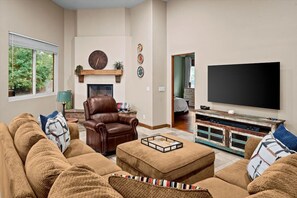 Cozy up on the comfy sectional and enjoy a show on the big screen TV!