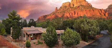 Nestled in the Chapel area of Sedona, this beautiful home is on a corner lot in a quiet neighborhood that backs to Mammoth Rock.