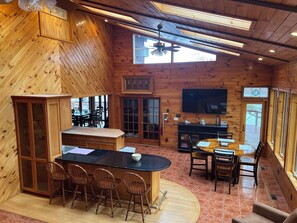 Great room view from spiral stairs to the Private Upper Level Suite.
