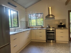 Spacious kitchen with your cooking essentials.