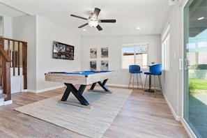 Game room with pool table and 55" Smart TV