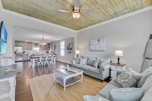 Beautiful beach decor living room | Stained shiplap accent ceiling