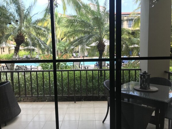 View of pool from inside condo