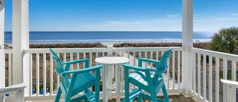 Your own deck overlooking the beach and pool for the perfect sunset!