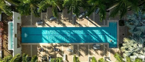 Experience the Size and Splendor of Our Outdoor Pool. A Spectacular Haven for Refreshing Swims and Leisure.