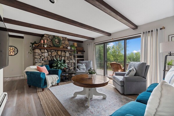 Swivel chairs and a stone fireplace (non-working at this time)