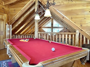 There's a game room plus a great sleeping space for kids in the loft