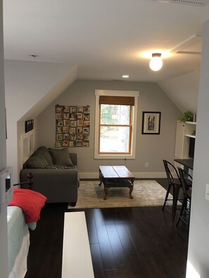 Loveseat and two bar stools.