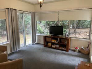 Second living area/playroom. TV with Apple TV and Netflix.
