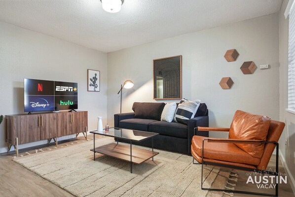 Living room with sleeper sofa and smart tv