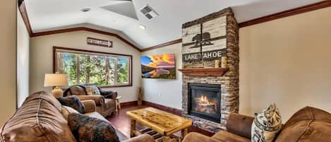 Enjoy movie night on the 65" HDTV with the whole family in this cozy living space