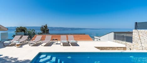 New! Villa Atopos with heated private pool, 5 bedrooms, Cinema room, panoramic sea views