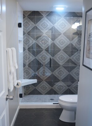 Brand new spa-like bathroom with a rain-fall shower head.
