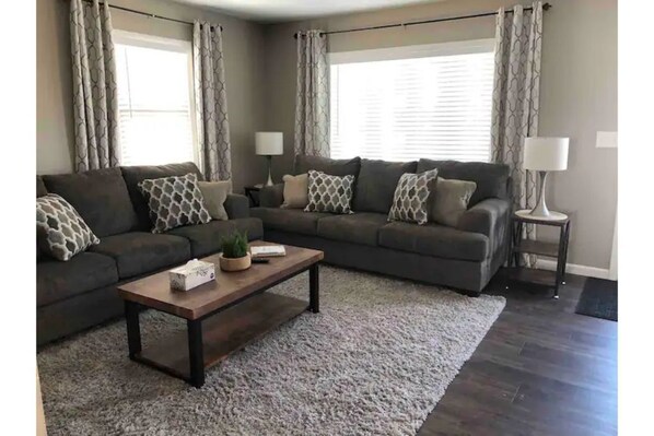 Living room has two full size couches
