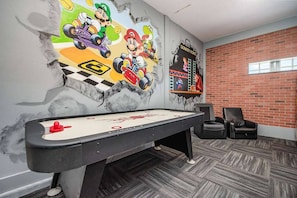 A dedicated game room designed for hours of entertainment and fun.