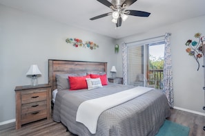 The master bedroom also has a sliding door to the private deck - the perfect spot to savor a morning cup of coffee while taking in the nature all around