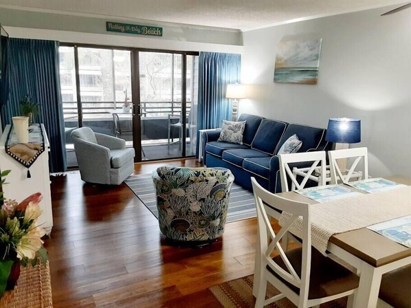 Living area with hardwood floors.