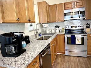 Kitchen with Keurig and Stainless Appliances 