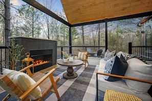 Back porch w/ beautiful gas fireplace