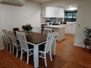 Dining table and kitchen