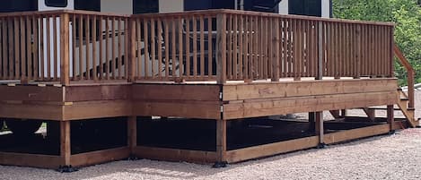 RV has a great deck with railing.