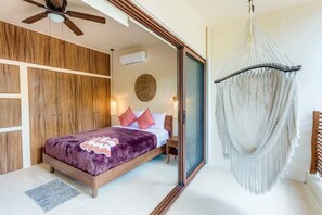 Open the sliders to extend the room & enjoy the hammock chair!
