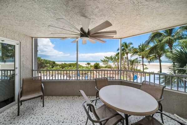 Cozy balcony that can sit up to 6 people with ceiling fan