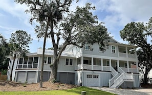 111 Forest Trail, Isle of Palms, South Carolina welcomes visitors with a beautiful exterior and private pool!