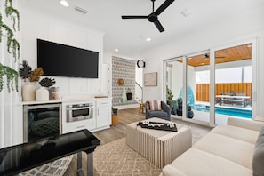 First Floor Living Room with Game Table and Wet bar