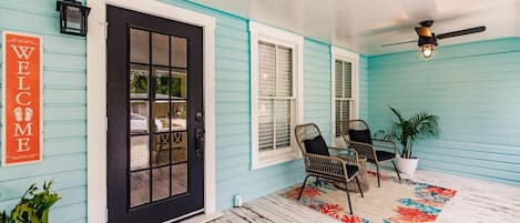 Spacious porch flooded with natural light. 