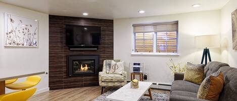 A gas fireplace and flat screen TV invite you to unwind and relax after a day of enjoying all that Aspen has to offer.