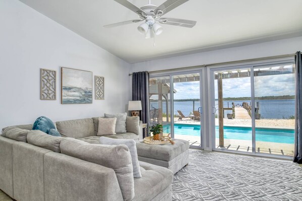 Enjoy poolside views from the living room.