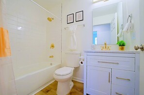 Main bathroom features a tub/shower combinations.