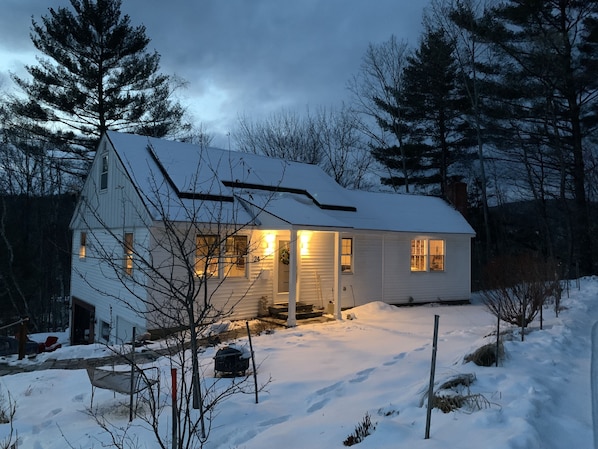 Picturesque view of cottage after a new-fallen snow!