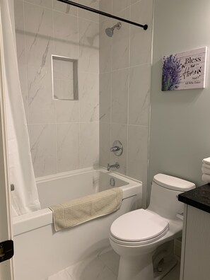 In-suite bathroom 1 with bathtub 