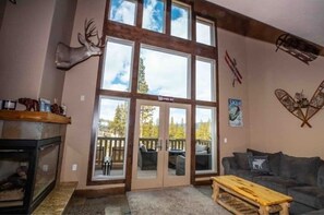 Floor to ceiling windows with panoramic mountain views