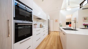 Fully equipped gourmet kitchen with double oven