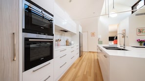 Fully equipped gourmet kitchen with double oven