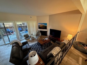 Ample comfy seating in the living area overlooking the patio—a seat for all