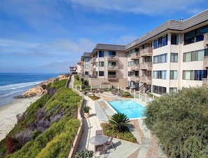 Del Mar Beach Club is right on the beach with semi-private access via staircase