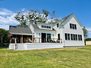 A glorious screened in porch and back deck bring the inside of this home out!
