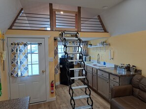 Loft with ladder down. 