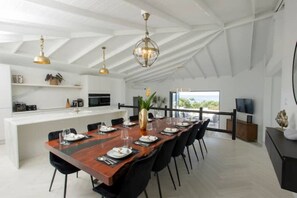 10 Seater mahogany dining table with views over the West Coast