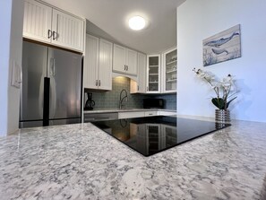 Granite countertops and stainless steal appliances make your kitchen luxurious