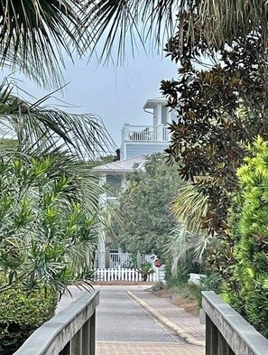 View of our home from private community boardwalk to the beach