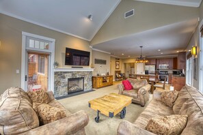 The living room and entrance to balcony