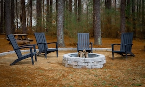 Fire pit with plenty of fire wood.