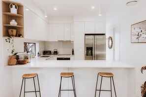 The kitchen is fully equipped with everything you need on your holiday